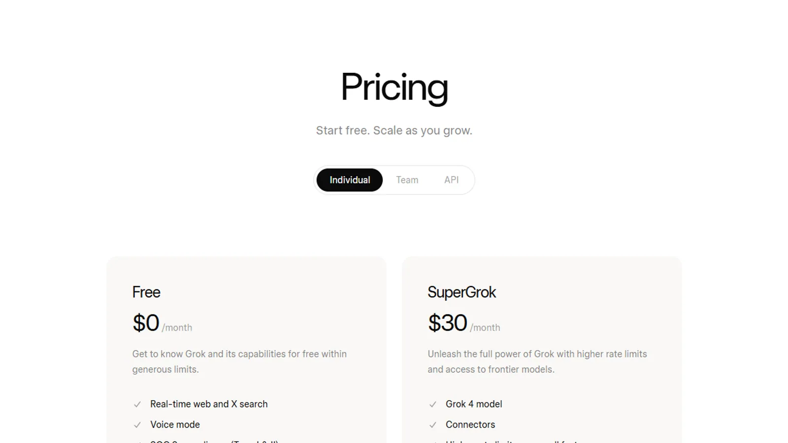 Official xAI pricing page showing Free and SuperGrok plan cards on desktop.